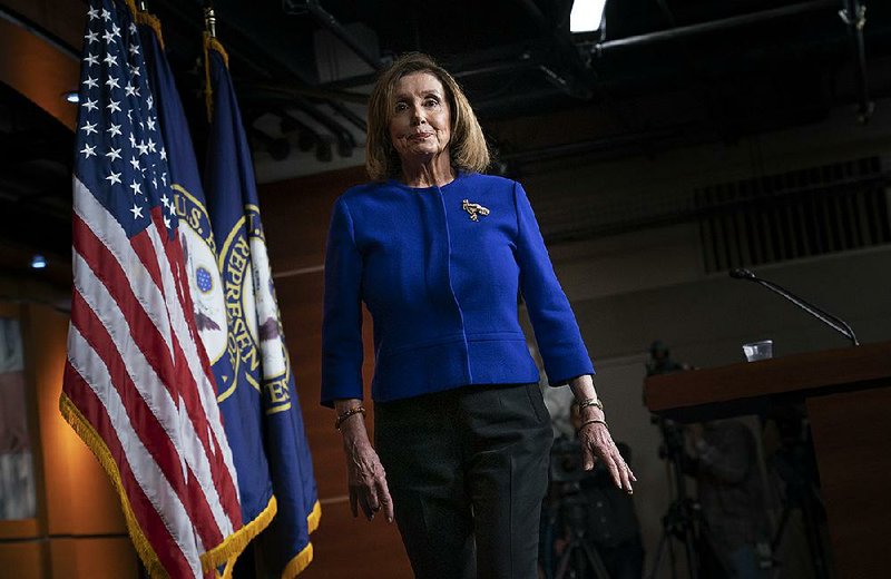 House Speaker Nancy Pelosi continued to hold firm Thursday on seeking Senate Majority Leader Mitch McConnell’s rules for an impeachment trial before sending over the House articles. McConnell responded by comparing that approach to “junior varsity political hostage situations.” More photos at arkansasonline.com/110pelosi/. 