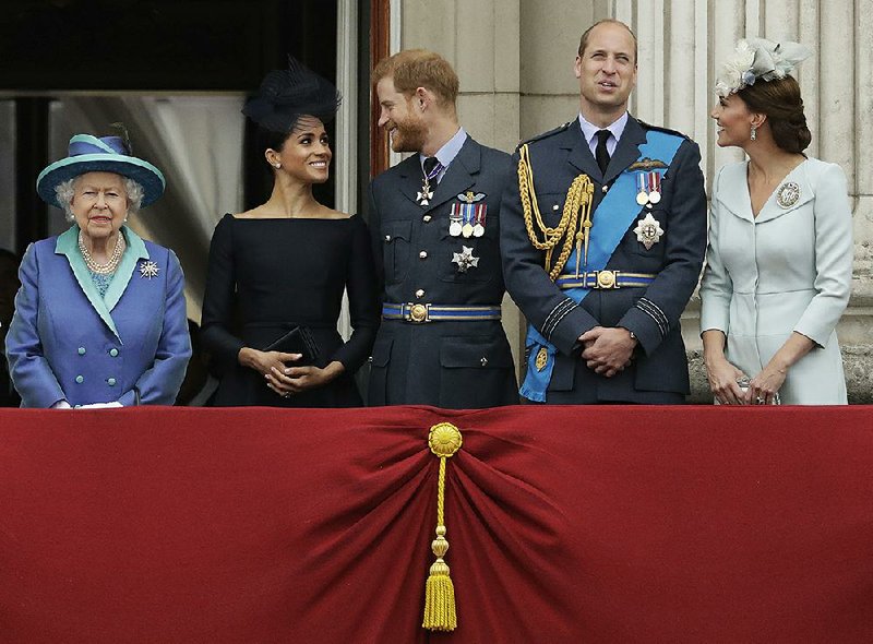 Britain’s Queen Elizabeth II (from left), Meghan the Duchess of Sussex, Prince Harry, Prince William and Kate the Duchess of Cambridge appear at Buckingham Palace in London in July 2018.  