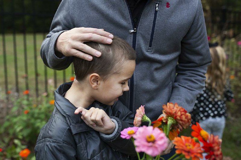 When Blake Collie, 8, had an aneurysm, his father, Mark Collie, turned to a Christian health-care-cost sharing ministry to help cover the costs. The Collies live in Washington, N.C.  