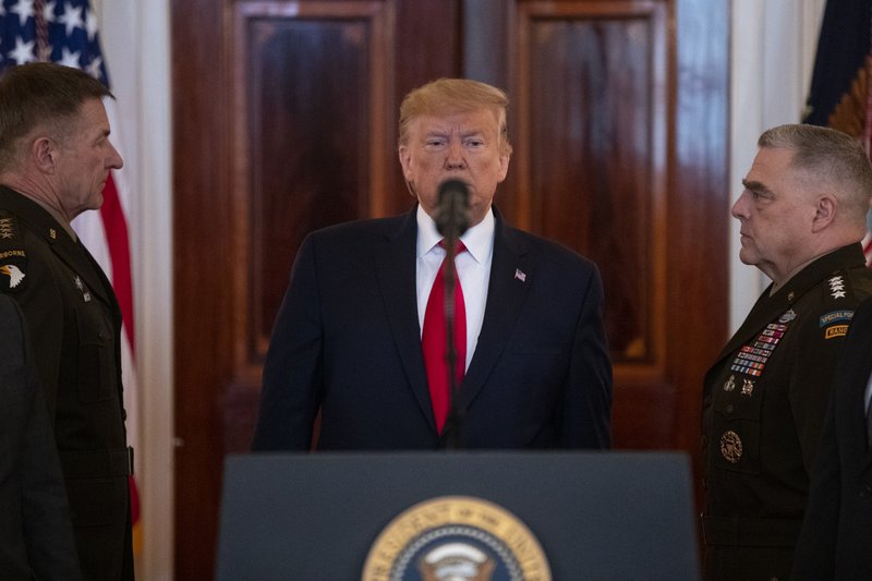 President Donald Trump arrives to address the nation from the White House on the ballistic missile strike that Iran launched against Iraqi air bases housing U.S. troops, Wednesday, Jan. 8, 2020, in Washington. (AP Photo/ Evan Vucci) story.lead_photo.caption