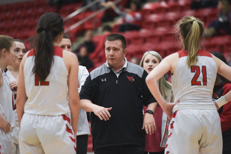 In this Jan. 3, 2020, file photo, Farmington head coach Brad Johnson talks to his players during a basketball game at Farmington High School.