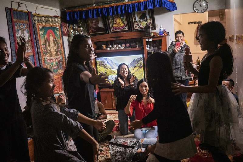 A birthday celebration takes place Dec. 14 in an apartment building in Brooklyn that is home to about 50 speakers of Seke, one of the world’s most obscure languages. The building is a microcosm of life back home and a bastion of the language.