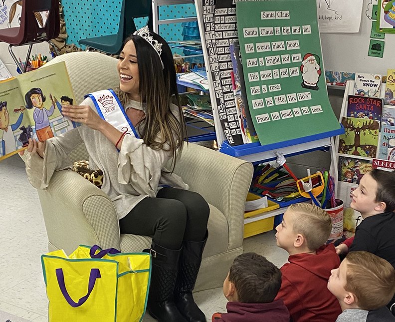 Miss Hot Springs for America, Yahaira Toyos, a Lake Hamilton graduate, recently visited Lake Hamilton Primary classes and read books about dental hygiene in English and Spanish. - Submitted photo