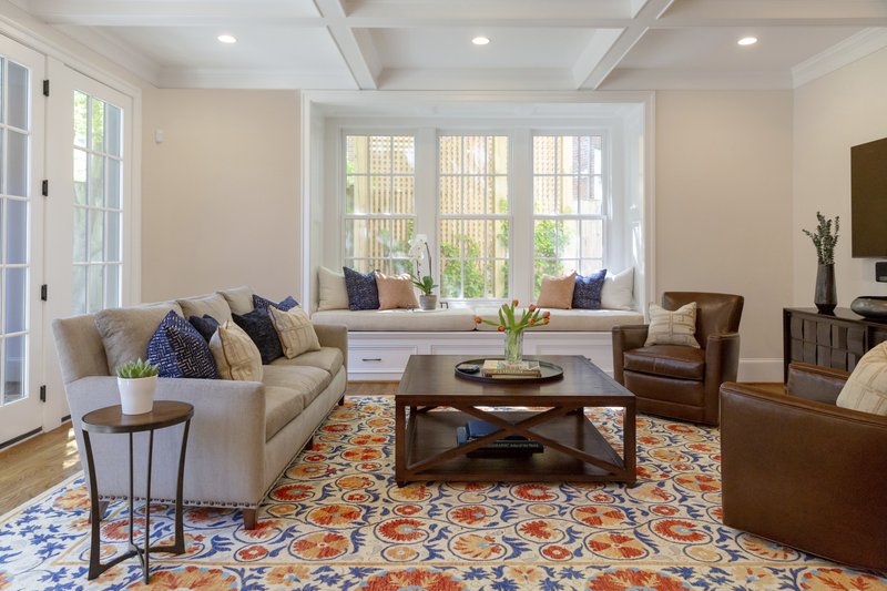 This undated photo shows a room design by designer Jessica Wachtel. If you're seeking to brighten up a room during the dark winter months, Wachtel suggests adding a patterned rug in light and bright colors, as she did in this Bethesda, Md., living room. (Photo by Joe Cereghino/Jessica Wachtel via AP)