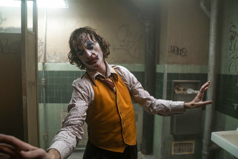 This image released by Warner Bros. Pictures shows Joaquin Phoenix in a scene from "Joker." On Monday, Jan. 13, the film was nominated for an Oscar for best picture. (Niko Tavernise/Warner Bros. Pictures via AP) story.lead_photo.caption