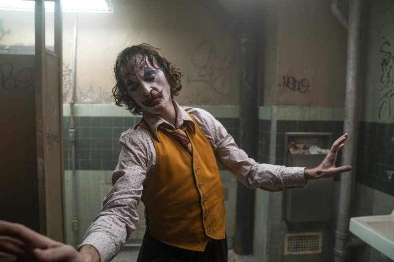 This image released by Warner Bros. Pictures shows Joaquin Phoenix in a scene from "Joker." On Monday, Jan. 13, the film was nominated for an Oscar for best picture. (Niko Tavernise/Warner Bros. Pictures via AP)

