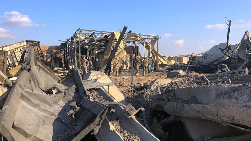 U.S. soldiers and journalists inspect the rubble at a site of Iranian bombing, in Ain al-Asad air base, Anbar, Iraq, Monday, Jan. 13, 2020. Ain al-Asad air base was struck by a barrage of Iranian missiles on Wednesday, in retaliation for the U.S. drone strike that killed atop Iranian commander, Gen. Qassem Soleimani, whose killing raised fears of a wider war in the Middle East. story.lead_photo.caption