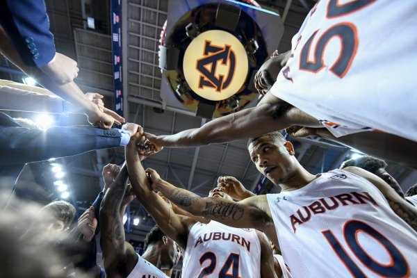 Auburn guard Samir Doughty (10) and the Tigers celebrate a win over Georgia in an NCAA college basketball game Saturday, Jan. 11 2020, in Auburn, Ala. (AP Photo/Julie Bennett)