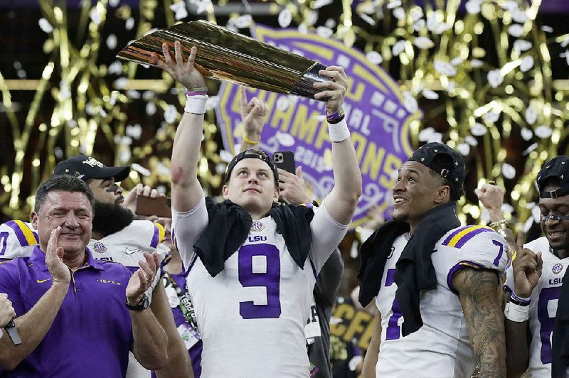 LSU wide receiver Ja'Marr Chase (1) celebrates after scoring with