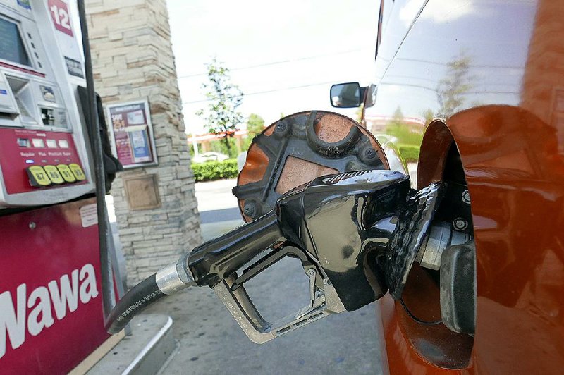 U.S. energy prices rose 1.4% in December from the previous month as gasoline prices climbed 2.8%, the Labor Department said Tuesday.
(AP/John Raoux)
