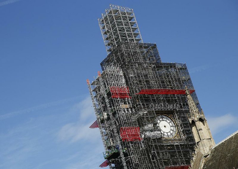 Scaffolding surrounds London’s Big Ben in this April 17, 2018, photo. Parliament’s famous clock tower is undergoing  four years of repair work, and its 15-ton bell is not scheduled to ring again until next year.
(AP/Alastair Grant)