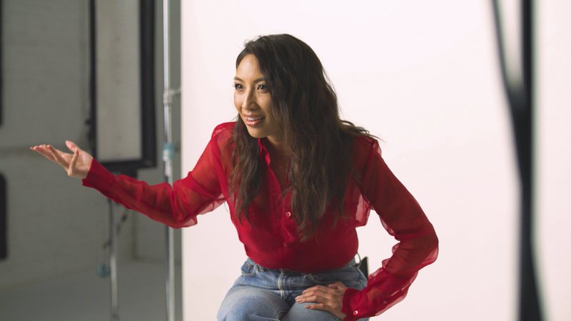 In this Nov. 22, 2019, photo provided by Ajinomoto, Jeannie Mai, co-host of TV's "The Real", is seen in New York filming a video for a campaign challenging Merriam-Webster's dictionary entry of "Chinese restaurant syndrome." Eddie Huang, a New York City-based chef and author (his memoir inspired the ABC sitcom "Fresh Off the Boat"), and TV's "The Real" co-host Mai are launching a social media effort Tuesday with Ajinomoto, the longtime Japanese producer of MSG seasonings. They plan to use the hashtag #RedefineCRS to challenge Merriam-Webster to rewrite the definition. 
(Courtesy of Ajinomoto via AP)