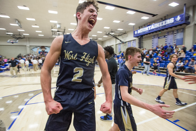 Dillon Bailey, Bentonville West point guard, celebrates after defeating Rogers 39-36 Tuesday, Jan. 14, 2020, at King Arena in Rogers.