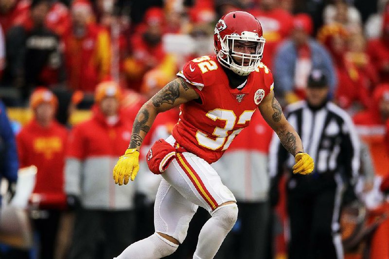 Kansas City safety Tyrann Mathieu (32) and teammate Frank Clark are two big reasons why the Chiefs are playing in the AFC Championship Game. (AP/Charlie Riedel)