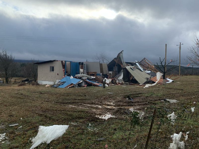 A home on Old Military Road in Midway stands in ruins Saturday, Jan. 11, 2020 after an EF-2 tornado struck Logan County on Friday.
(Arkansas Democrat-Gazette/Thomas Metthe)