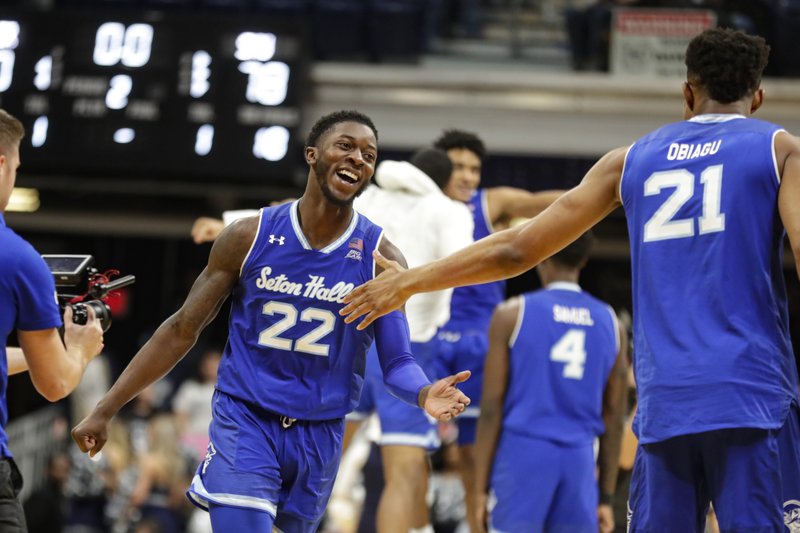 Seton Hall guard Myles Cale (22) celebrates with center Ike Obiagu (21) following an NCAA college basketball game against Butler in Indianapolis, Wednesday, Jan. 15, 2020. Seton Hall defeated Butler 78-70. (AP Photo/Michael Conroy)
