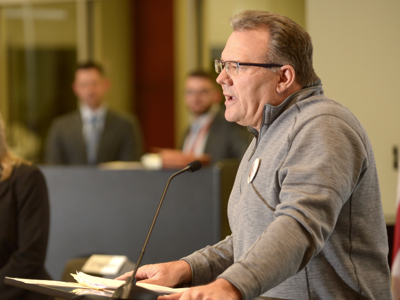 In this 2018 file photo, Rick Neal, superintendent of the Pea Ridge School District, speaks alongside Pea Ridge High School students Brett Kirby and Hunter White and teacher Cathy Segur, during the NWA Education Forum at the Don Tyson School of Innovation in Springdale. Neal notified the School Board he's resigning.