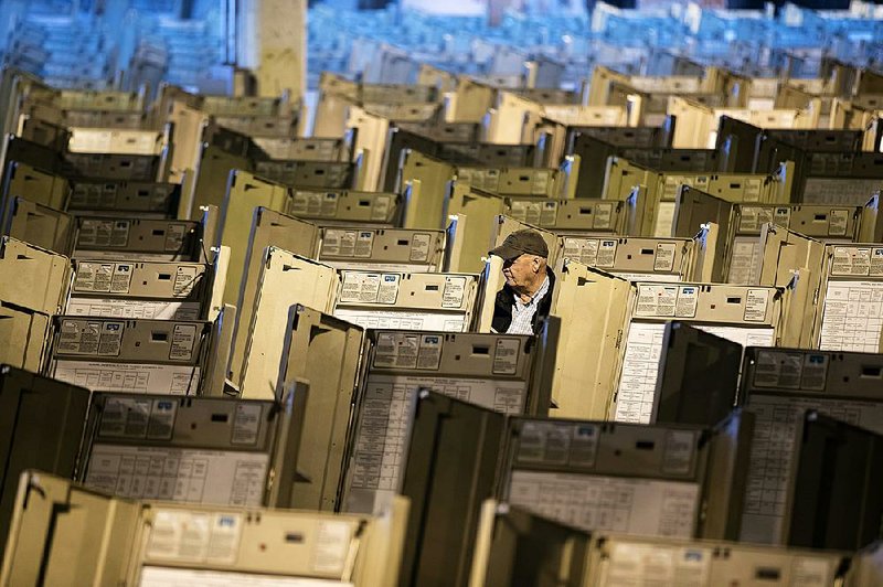 A technician works to prepare voting machines for the November 2016 presidential election in Philadelphia.  