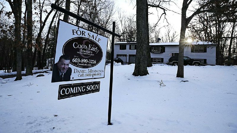 Mortgage rates rose 3.65% this week from 3.64% last week, buoyed by news of a solid economy and easing of geopolitical tensions.
(AP/Charles Krupa)