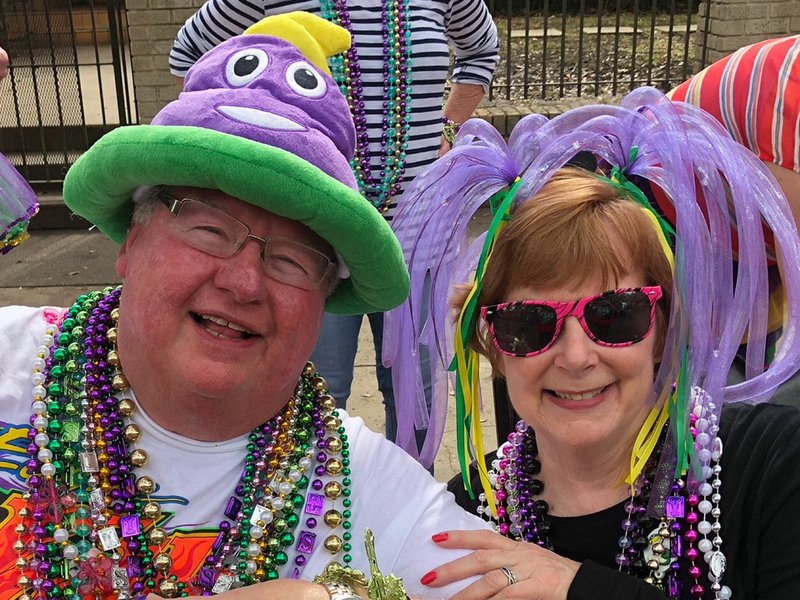 The Mardi Gras Costume Ball & Contest Queen and King Peggy and John Holt celebrate at the 2018 New Orleans Mardi Gras parade. - Submitted photo