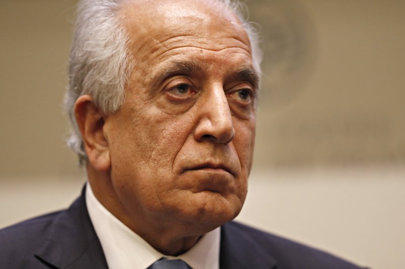 FILE - In this Feb. 8, 2019, file photo, Special Representative for Afghanistan Reconciliation Zalmay Khalilzad pauses while speaking about the prospects for peace, at the U.S. Institute of Peace, in Washington. Afghanistan&#x2019;s former deputy minister says Khalilzad is in the Afghan capital &#x201c;to discuss the latest in peace efforts.&#x201d; Former deputy foreign minister Hekmat Karzai tweeted pictures of his meeting with Khalilzad Wednesday, Dec. 4, 2019, saying &#x2018;we spoke about the way forward.&#x201d;  (AP Photo/Jacquelyn Martin, File)