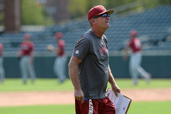 Arkansas coach Dave Van Horn directs his players Friday, Sept. 6, 2019, during practice at Baum-Walker Stadium in Fayetteville. 
