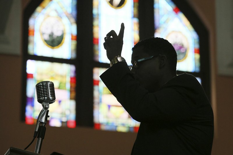 The Rev. Shanan Jones delivers a sermon at Ebenezer Baptist Church in Atlanta. According to a study released in December by the Pew Research Center, the median length of U.S. sermons in April and May 2019 was 37 minutes. Catholic sermons were the shortest, at a median of just 14 minutes, compared with 25 minutes for sermons in mainline Protestant congregations and 39 minutes in evangelical Protestant congregations. Historically black Protestant churches had by far the longest sermons, at a median of 54 minutes. (Atlanta Journal-Constitution via AP / Curtis Compton)
