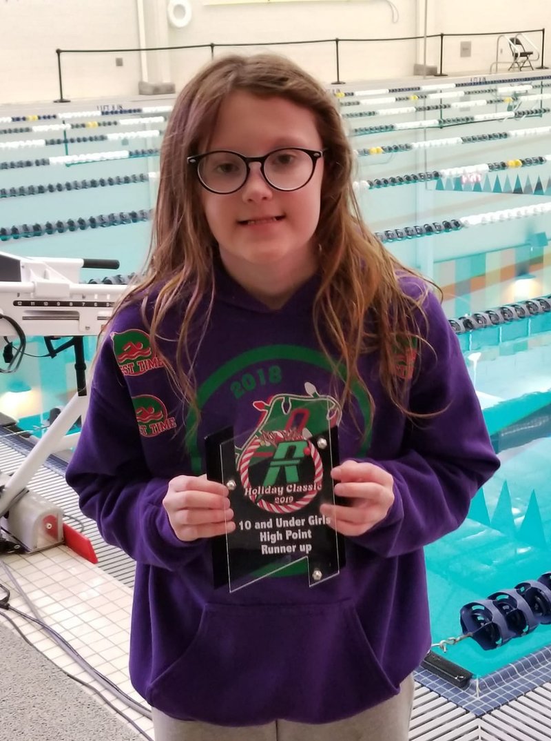 Hot Springs Family YMCA Seal Aubrey Schmitt was the runner up for the 10-and-under girls high-point award at the CASC Holiday Classic last month in Benton. She won seven of her nine events at the meet. Photo courtesy of Jim Norman. - Submitted photo