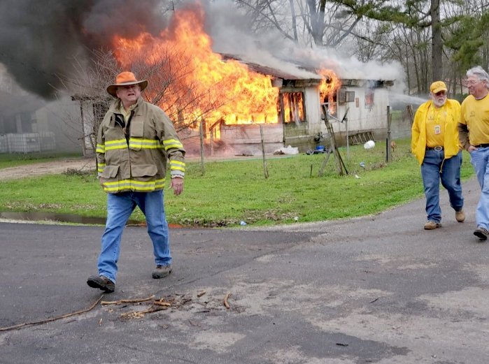 Volunteers outside a house fire in Montrose. (Courtesy photo/Arkansas Baptist State Convention Disaster Relief)