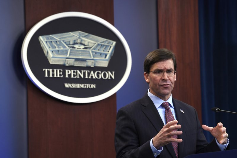 The Associated Press FOREIGN TRAINEES: In this Dec. 20, 2019 file photo, Defense Secretary Mark Esper speaks during a news conference at the Pentagon in Washington. After the Pensacola shooting, Defense Secretary Mark Esper ordered a review of the Pentagon's handling of foreign military trainees. The results, announced Friday, put foreign trainees under new limitations, including their travel away from their assigned base; their possession and use of firearms and their access to bases and other U.S. facilities.