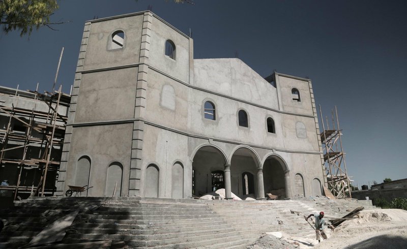 The Cathedral in Port-au-Prince, Haiti, remains in ruins 10 years after the earthquake. Protracted political turmoil plus growing insecurity and a collapsing economy have affected every aspect of rebuilding after the 2010 natural disaster, from the cost and availability of construction materials to workers’ ability to get to their job sites. 