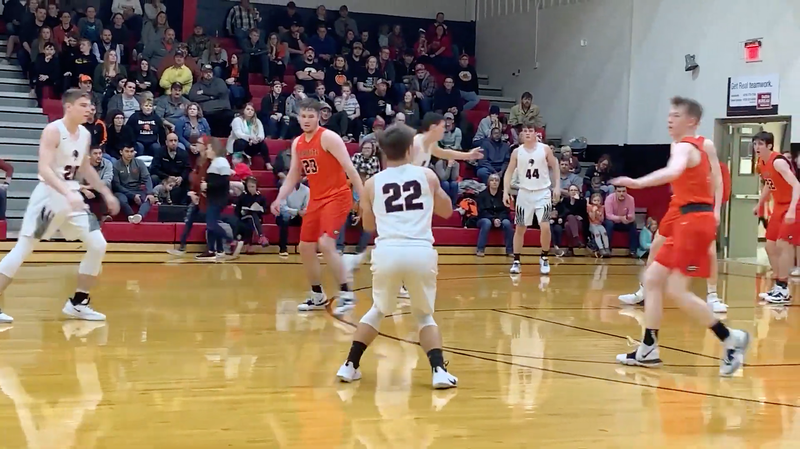 A Pea Ridge player gets set to shoot a three-point shot during Friday night's game in this video screenshot.