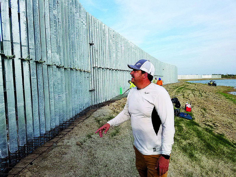 Tommy Fisher of Fisher Industries surveys border fencing that he’s building on private land in south Texas. “We’ll protect southern Texas faster than they ever dreamed,” he said.
(Los Angeles Times/Molly Hennessy-Fiske)