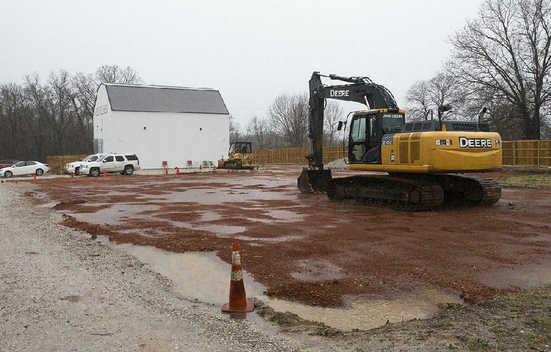 Land is cleared Thursday for a marijuana greenhouse to be built at the ReLeaf Center in Bentonville. More photos at nwaonline.com/200118Daily/
(NWA Democrat-Gazette/Charlie Kaijo)