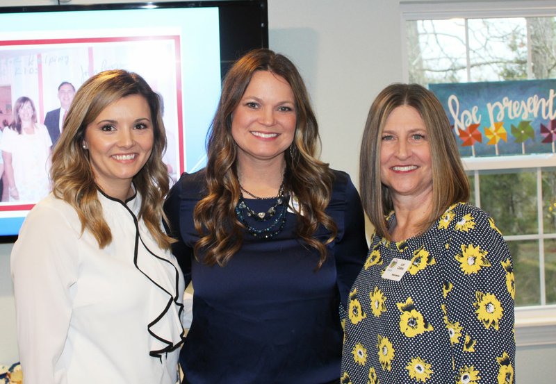 Brooke Boles (from left), Natalie Tibbs and Lori Collins gather at the open house to mark the 20th anniversary of the Children's Advocacy Center of Benton County in Little Flock. (NWA Democrat-Gazette/Carin Schoppmeyer)