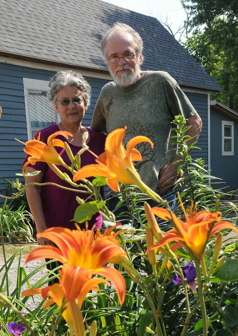 Anita and Edward Hejtmanek brought together their creative talents and their heart for the community in Heartwood Gallery, which operated in south Fayetteville for 19 years. The artists' cooperative closed Dec. 31. (NWA Democrat-Gazette / File Photos)