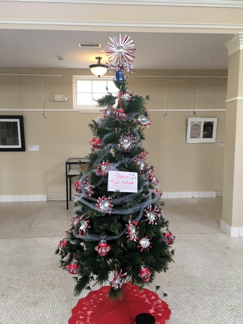 Benton High School garnered the most votes for its festive tree with red and silver soda can ornaments. - Submitted photo