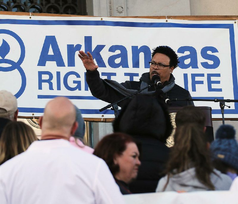 Anti-abortion activist Ryan Bomberger speaks during Sunday’s rally at the state Capitol in Little Rock.  