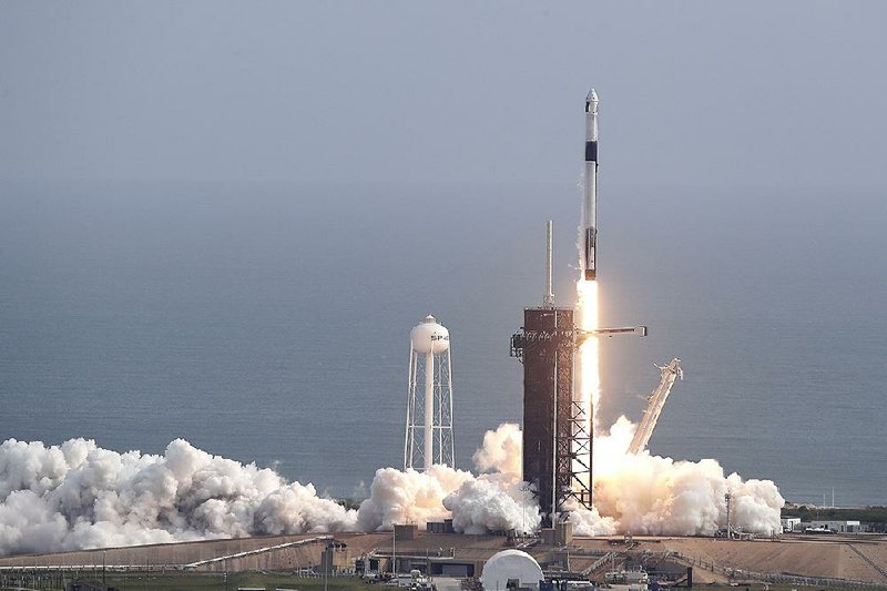 SpaceX’s Falcon 9 rocket lifts off from the Kennedy Space Center in Cape Canaveral, Fla., on Sunday.  