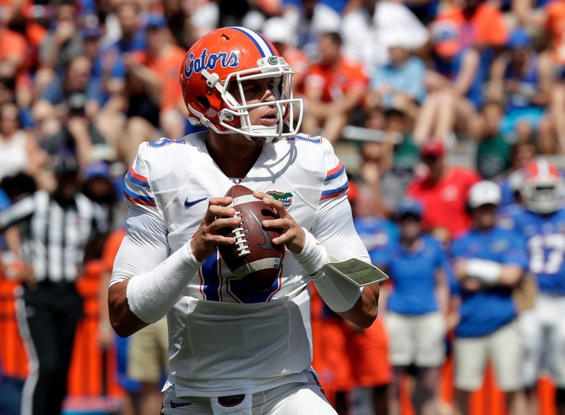 In this April 14, 2018, file photo, Florida quarterback Feleipe Franks looks for a receiver during an NCAA spring college football intrasquad game, in Gainesville, Fla. (AP Photo/John Raoux, File)