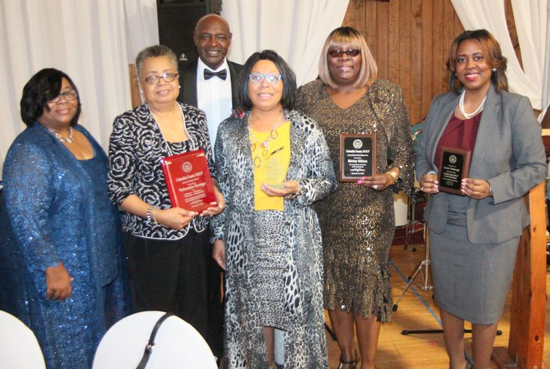 The Columbia County Chapter of the NAACP held its annual Freedom Fund Banquet Saturday night. Pictured are (from left) president Carol Garland, Barrier Breaker Award recipient Velma George, Making a Difference Community Service Award winner James Jefferson, Making a Difference Award honoree Sarah Williams, Longevity African-American Business Owner recipient Shirley Gilliam and guest speaker Attorney Jessica Yarbrough. Not pictured is Making A Difference Award recipient Darrell Howell.
