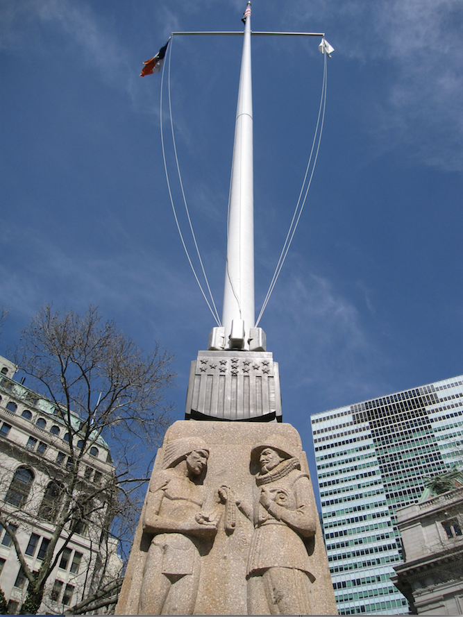 A sculpture at the base of the Netherlands Memorial Flagpole is a gift to New York from the Netherlands. The sculpture symbolizes the purchase of Manhattan from American Indians by Dutchman Peter Minuit and the creation of New Amsterdam. It is located across from the National Museum of the American Indian.
(AP)
