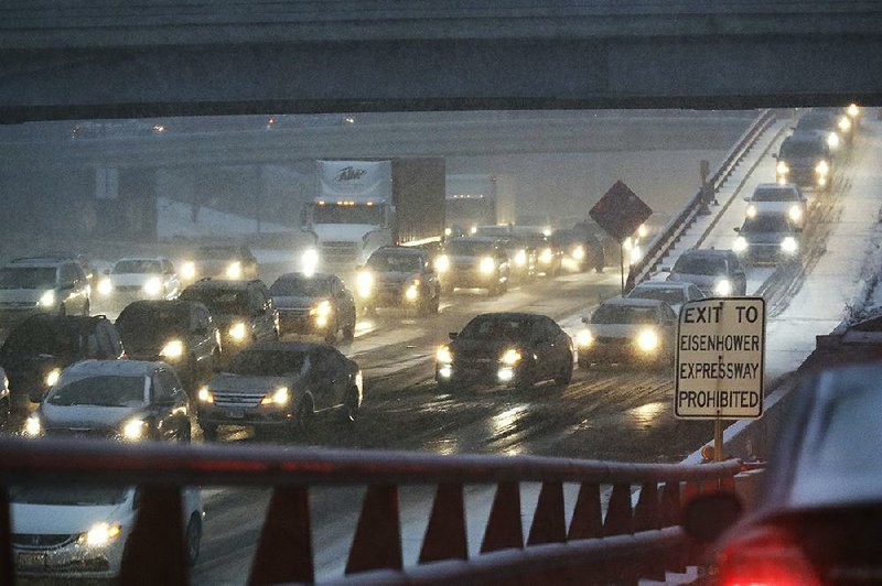 The Eisenhower Expressway in Chicago sees heavy traffic Friday. The Trump administration has backed away from its plan to freeze automobile fuel economy standards at 2020 levels, sources say.
(AP/Nam Y. Huh)