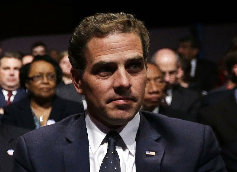 In this Oct. 11, 2012, file photo, Hunter Biden waits for the start of the his father's, Vice President Joe Biden's, debate at Centre College in Danville, Ky. In 2014, then-Vice President Joe Biden was at the forefront of American diplomatic efforts to support Ukraine's fragile democratic government as it sought to fend off Russian aggression and root out corruption. 
 (AP Photo/Pablo Martinez Monsivais, File)