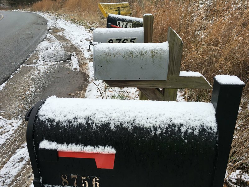 Snow frosts the tops of rural mailboxes early Wednesday Jan. 22 2020 in east Benton County, near Rocky Branch park on Beaver Lake. Go to nwaonline.com/200123Daily/ for today's photo gallery.
(NWA Democrat-Gazette/Flip Putthoff)