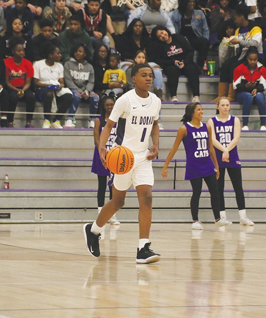 Siandhara Bonnet/News-Times El Dorado's Isaiah Ramey brings the ball up the floor during the Wildcats' contest against Magnolia at Wildcat Arena. El Dorado downed Texarkana 71-65 in overtime on Tuesday.