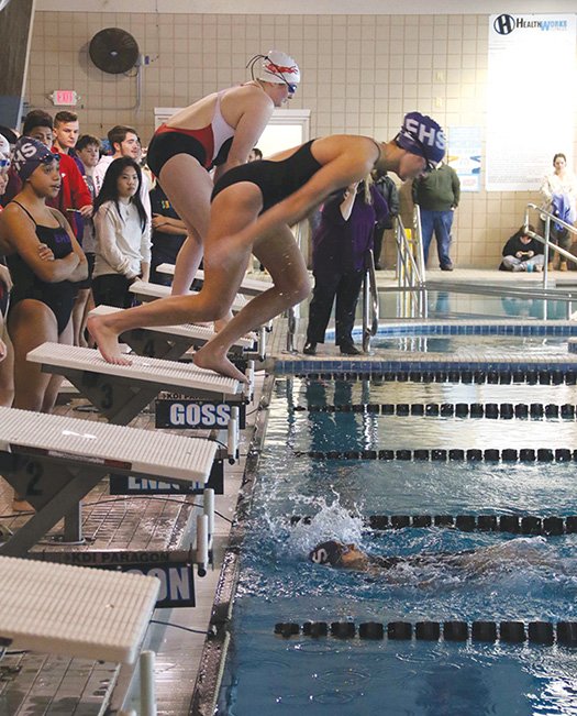 Siandhara Bonnet/News-Times El Dorado's Abigail Thompson prepares to jump in the water as Jana Powell touches the time plate Tuesday during the girls 200-yard medley relay at the 2020 EHS Invitational.