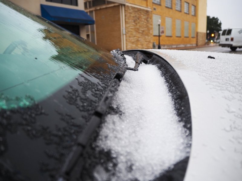 Sleet accumulates on carhood in downtown Magnolia Wednesday morning at 8 a.m. 