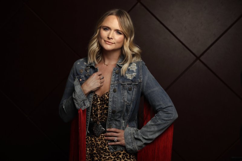 "For Wildcard I wanted songs that were more rock songs. I took into account my live show. I wanted them to be fun songs to play live," says Miranda Lambert, who will play those songs for fans today at Simmons Bank Arena.
(AP/Mark Humphrey)