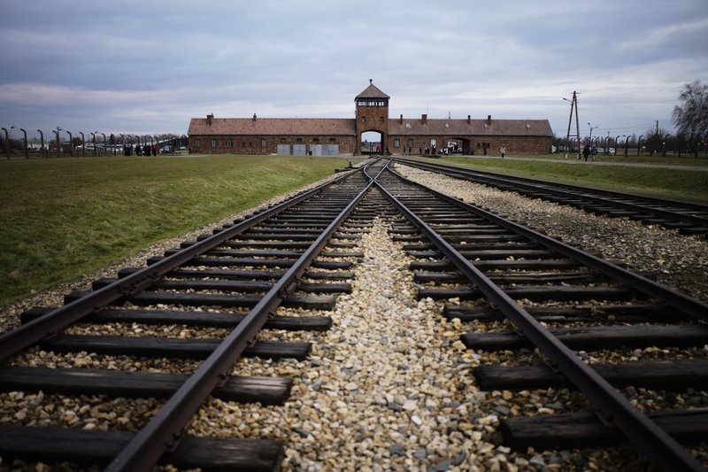 In this Dec. 7, 2019, file photo, are railway tracks from where where hundreds of thousands of people were directed to the gas chambers directed to the gas chambers to be murdered inside the former Nazi death camp of Auschwitz Birkenau or Auschwitz II, in Oswiecim, Poland. World leaders will gather twice to mark the 75th anniversary of the liberation of the Auschwitz-Birkenau concentration camp -- once today in Jerusalem and again on Monday at the Auschwitz site in southern Poland. The fact that there will be two competing ceremonies reflects how politically charged World War II remains for nationalist governments in Russia and Poland. - AP Photo/Markus Schreiber